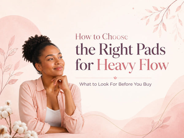 Woman comparing Moyo Comforts Maxi and Overnight Pads to choose the right 100% organic cotton period protection for heavy flow.